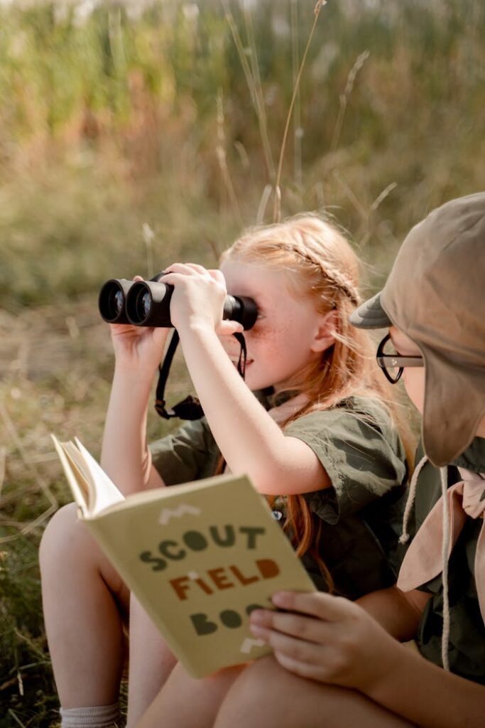 Scout Looking through Binoculars